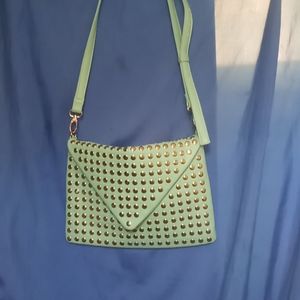 Purse never used hung in closet